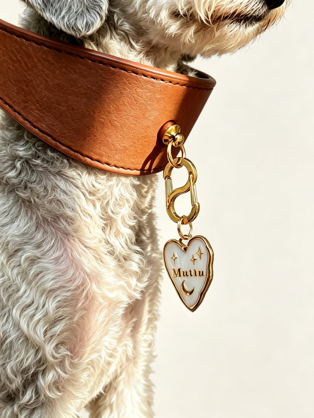 Muttu Faux Leather Pet Collar – model wearing brown PU leather collar with customizable Muttu heart charm pendant engraved with your pet's name or owner's name, close-up lifestyle shot. Pendant sold separately.