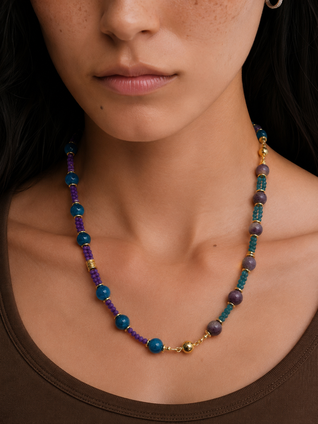 Violet Galaxy 2-in-1 Magnetic Crystal Necklace – model wearing blue apatite and lepidolite beaded necklace with gold magnetic clasp, close-up neck shot on dark background